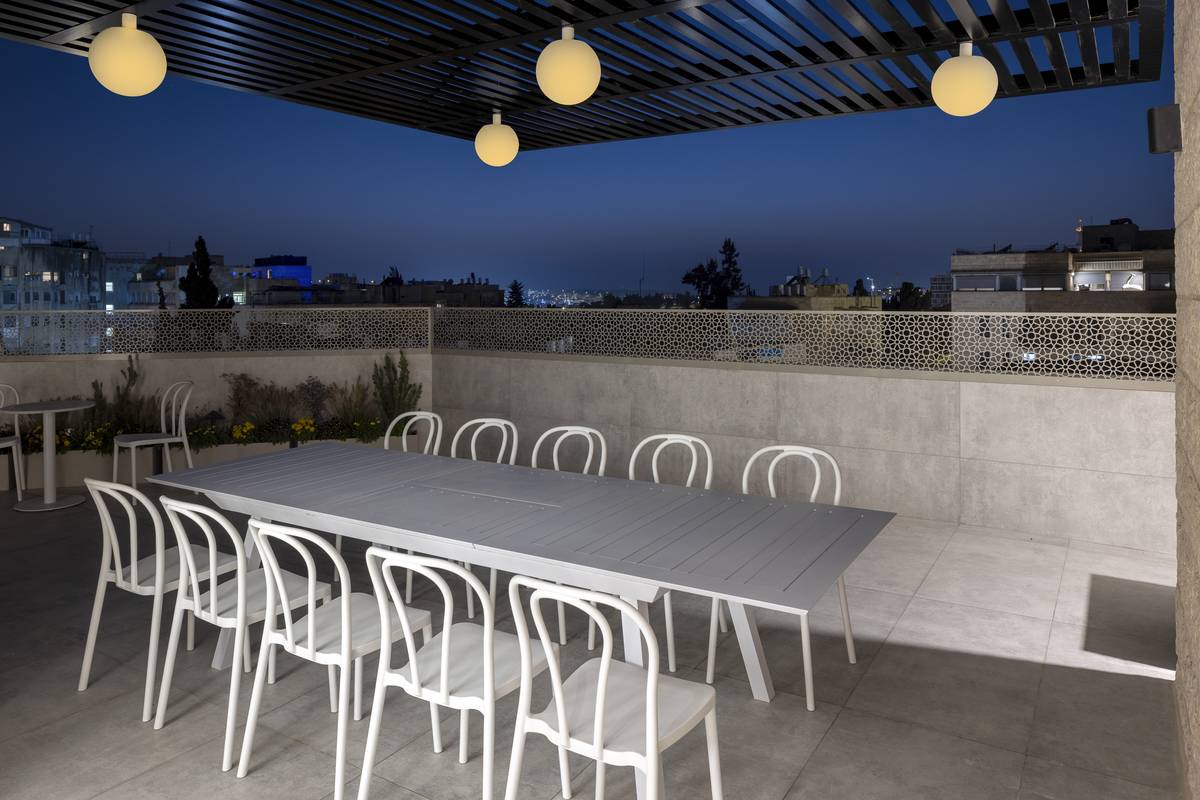 Heated rooftop pool and outdoor dining terrace at Aura Penthouse Jerusalem – photo 1
