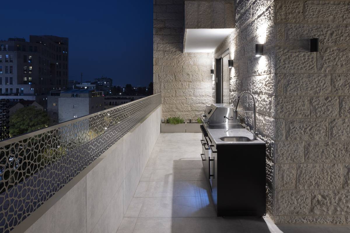 Heated rooftop pool and outdoor dining terrace at Aura Penthouse Jerusalem – photo 2