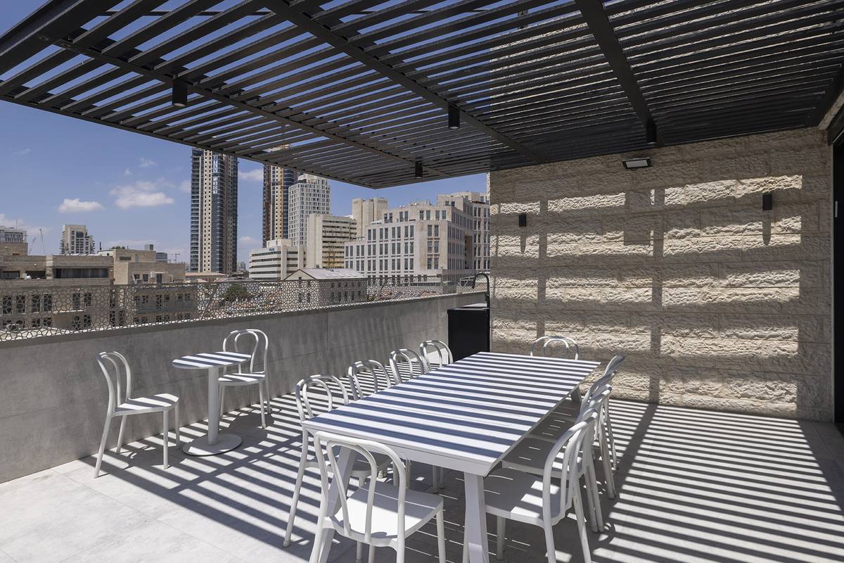 Heated rooftop pool and outdoor dining terrace at Aura Penthouse Jerusalem – photo 5