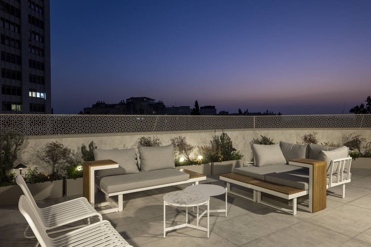 Heated rooftop pool and outdoor dining terrace at Aura Penthouse Jerusalem – photo 8
